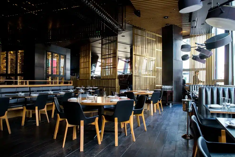 Regular diners eating at a busy restaurant that rewards repeat customers with loyalty points